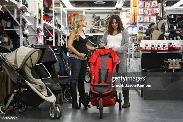 Actress Marcy Rylan and actress Jessica Leccia shop at Buy Buy Baby on April 20, 2009 in New York City.