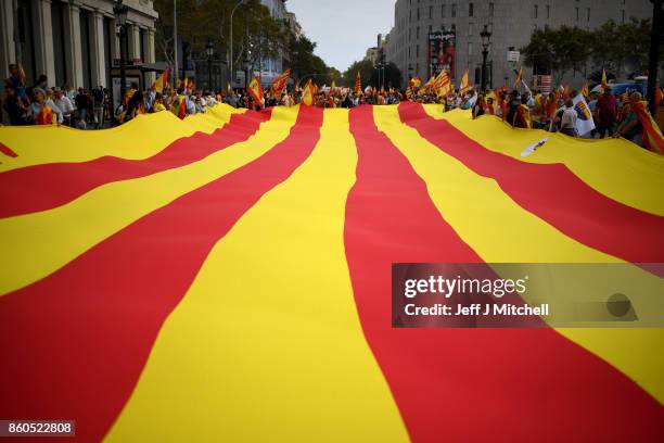 Thousands gather in Barcelona for a Spanish National Day Rally on October 12, 2017 in Barcelona, Spain. Spain marked its National Day with a show of...