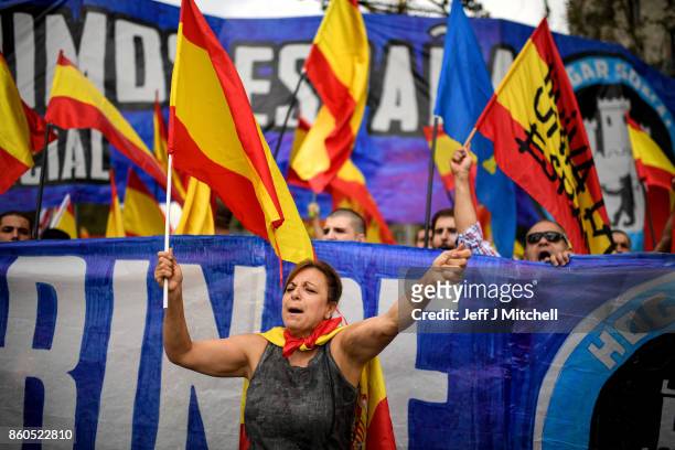 Thousands gather in Barcelona for a Spanish National Day Rally on October 12, 2017 in Barcelona, Spain. Spain marked its National Day with a show of...