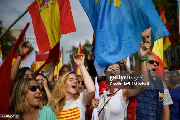 Thousands gather in Barcelona for a Spanish National Day Rally on October 12, 2017 in Barcelona, Spain. Spain marked its National Day with a show of...