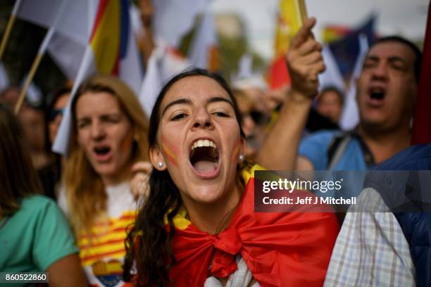 Thousands gather in Barcelona for a Spanish National Day Rally on October 12, 2017 in Barcelona, Spain. Spain marked its National Day with a show of...