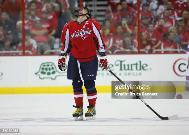 Alex Ovechkin of the Washington Capitals looks up after missing a third period shot against the New York Rangers during Game Two of the Eastern...