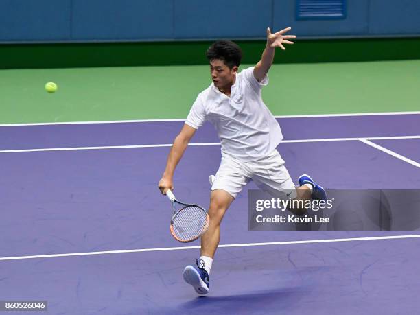 Wu Yibing of China in action in the match between Wu Di of China and Wu Yibing of China and Oliver Marach of Austria and Mate Pavic of Croatia in...