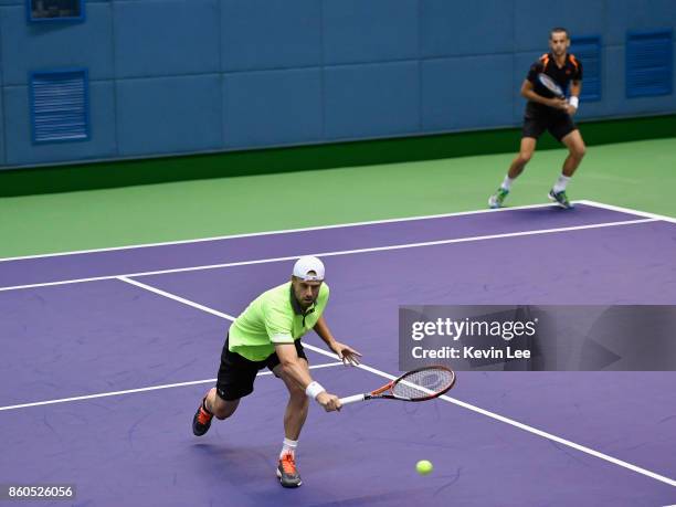 Oliver Marach of Austria and Mate Pavic of Croatia in action in the match between Wu Di of China and Wu Yibing of China and Oliver Marach of Austria...