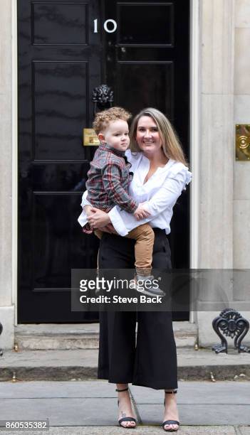 Yvonne MacHugh, fiance of Billy Irving, and her two year old son, William, deliver a petition to 10 Downing Street along other family members of the...