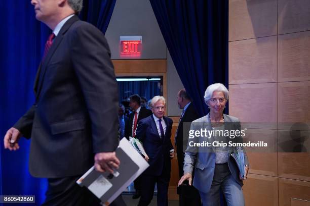 International Monetary Fund Managing Director Christine Lagarde arrives for the opening news conference of the World Bank Group and the IMF's annual...