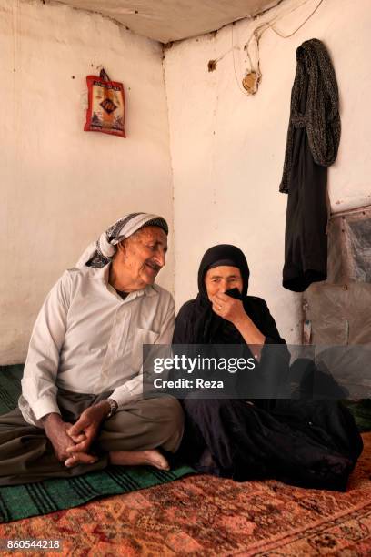 Portrait of Haji Hamad Omar and his wife Hamin Rashid Khadar. Born in 1945, Haji Hamad Omar was forced to flee Sakran with his family and they all...