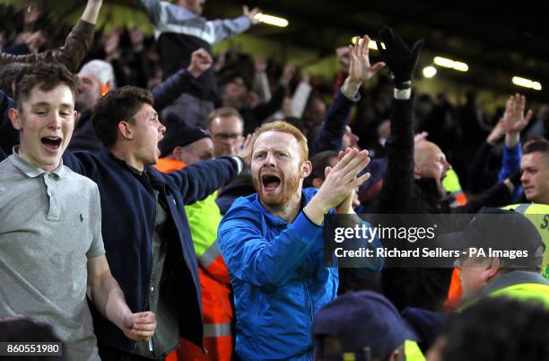 Fans in the stands show their support