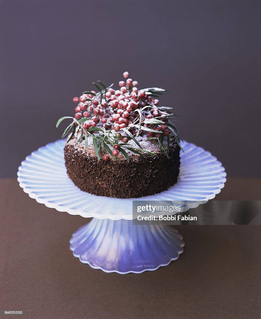 Cake with winter berry decoration