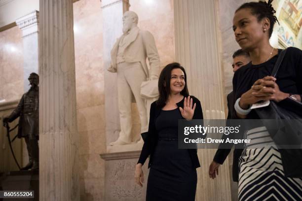 Sheryl Sandberg, chief operating officer of Facebook, walks to a meeting with members of the Congressional Black Caucus, at the U.S. Capitol, October...