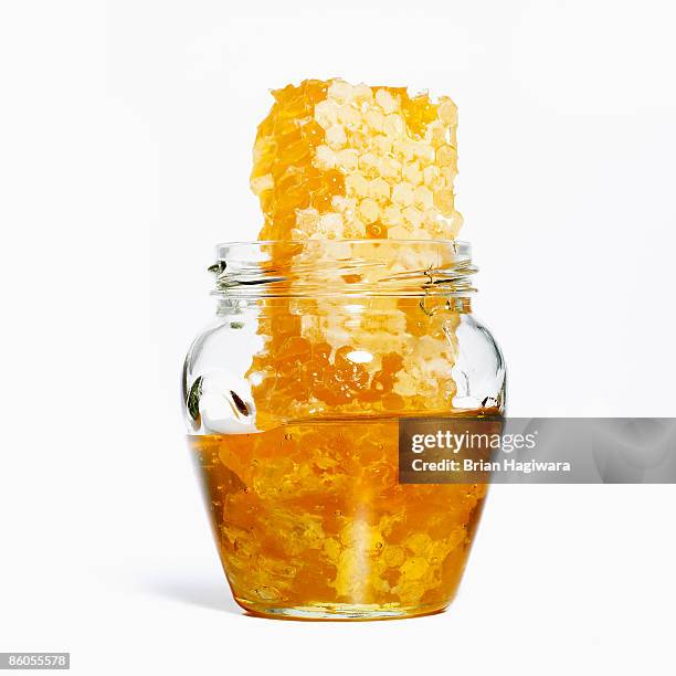 honeycomb in a jar - honey stock pictures, royalty-free photos & images
