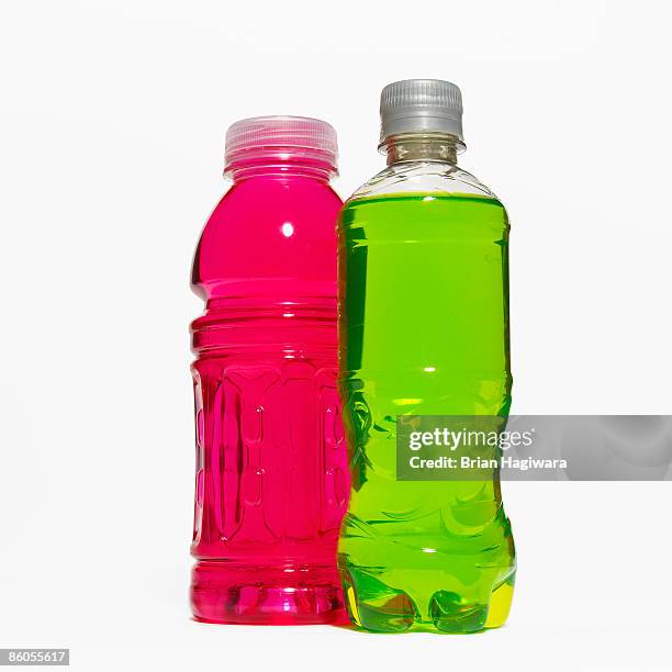 bottles of soft drink - energydrink stock-fotos und bilder