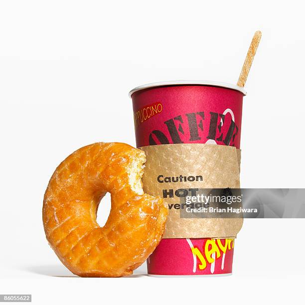 coffee and doughnut - biting donut stock pictures, royalty-free photos & images