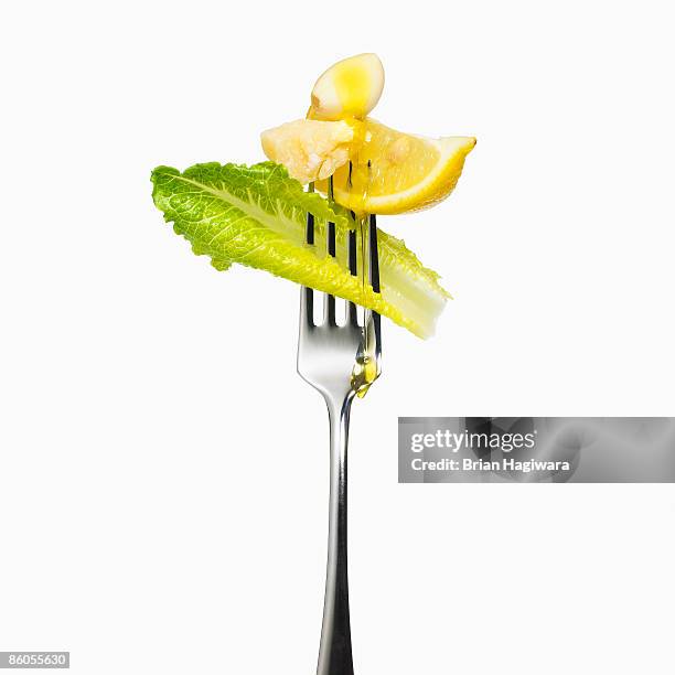 caesar salad and fork - ceasarsallad bildbanksfoton och bilder