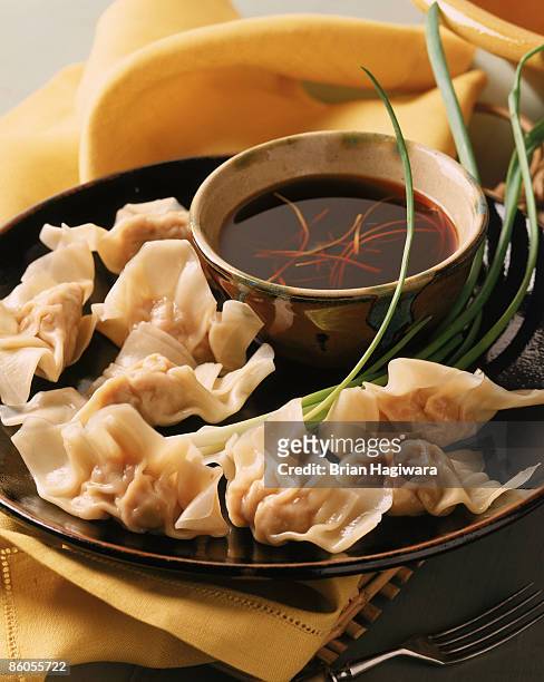 pork dumplings with soy sauce - korean food stock pictures, royalty-free photos & images