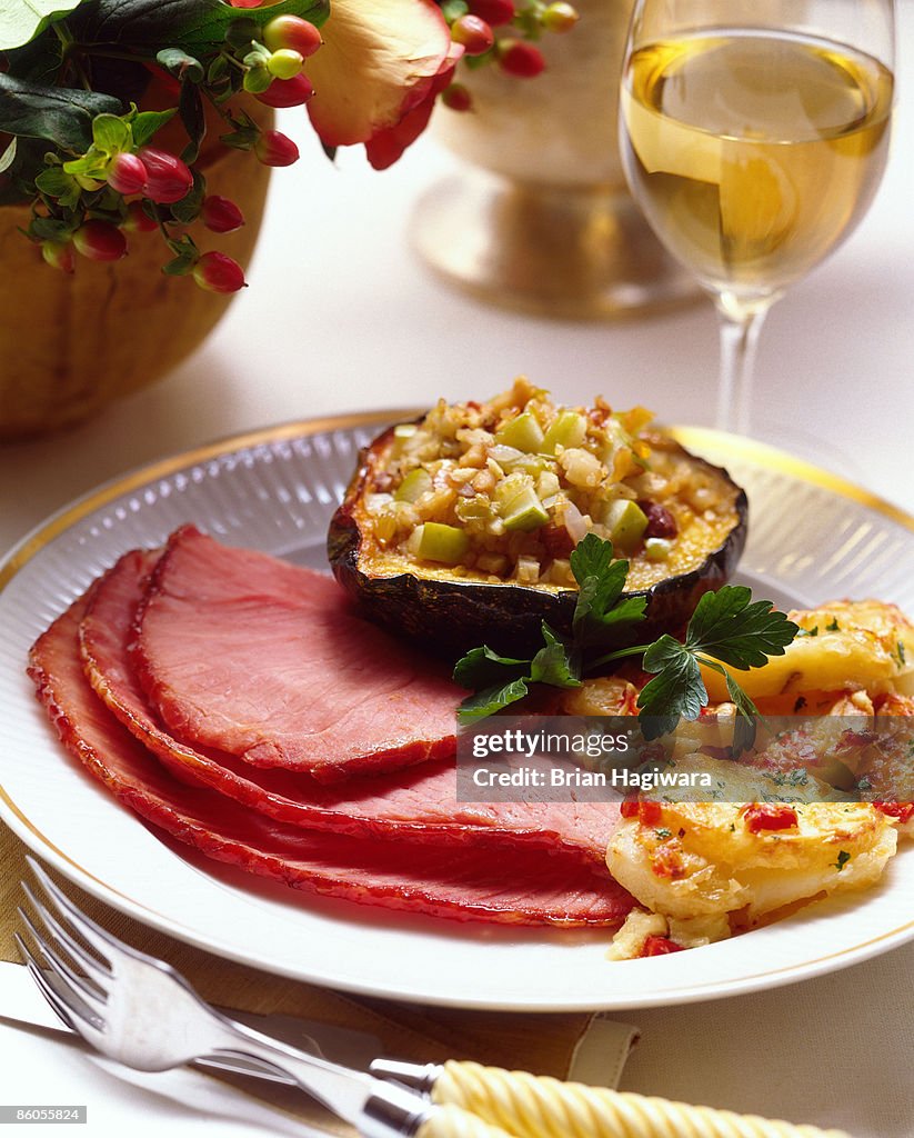 Baked ham with scalloped potatoes and acorn squash
