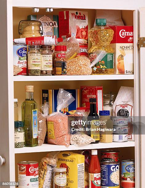 health food in a pantry - speisekammer stock-fotos und bilder