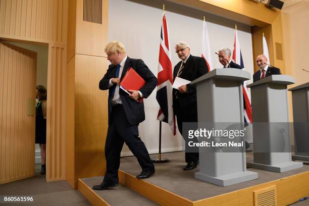 Britain's Foreign Secretary Boris Johnson , Poland's Foreign Minister Witold Waszczykowski , Britain's Defence Secretary Michael Fallon and Poland's...