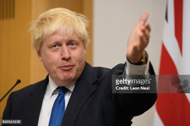 Britain's Foreign Secretary Boris Johnson addresses members of the media during a joint UK/Poland press conference in the Foreign and Commonwealth...