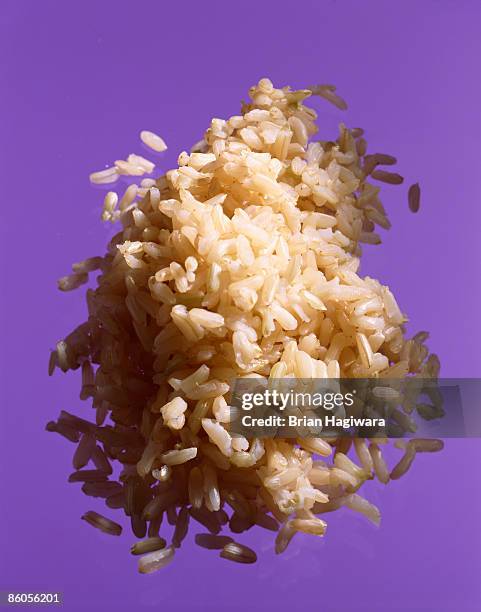 cooked brown rice - brown rice stock pictures, royalty-free photos & images