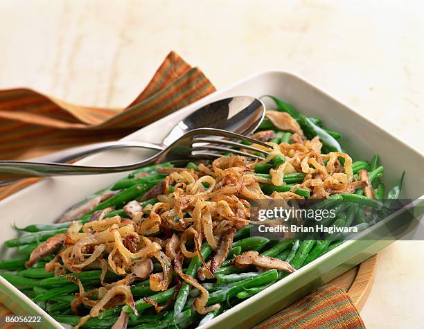 green bean casserole with fried onions - side dish stock pictures, royalty-free photos & images