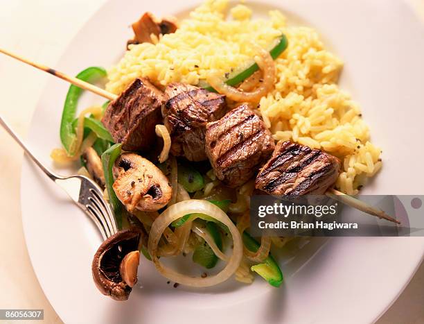 souvlaki with vegetables and rice - schaschlik stock-fotos und bilder