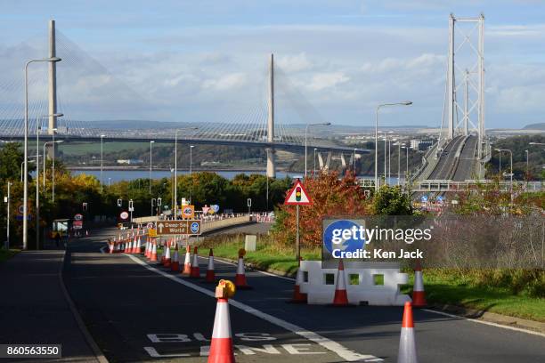 The old Forth Road Bridge alongside the new Queensferry Crossing , as Transport Scotland announces it will re-open to some scheduled bus services on...