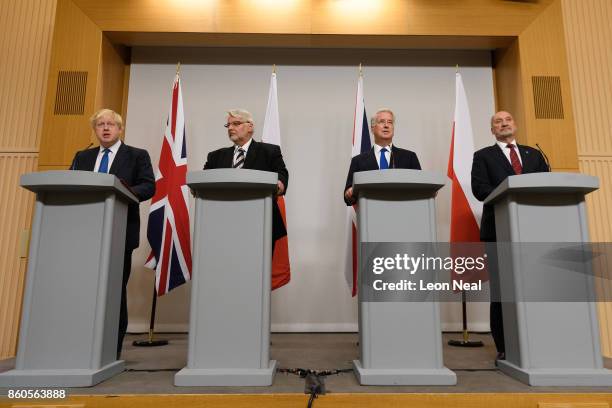 Britain's Foreign Secretary Boris Johnson , Poland's Foreign Minister Witold Waszczykowski , Britain's Defence Secretary Michael Fallon and Poland's...