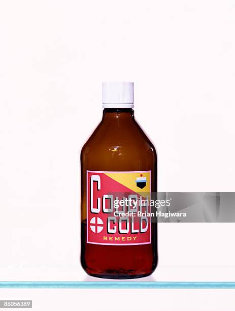 cold syrup bottle - cough syrup stock pictures, royalty-free photos & images
