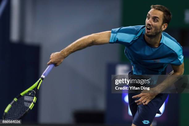 Viktor Troicki of Serbia serves during the Men's singles match against John Isner of United States on day 5 of 2017 ATP Shanghai Rolex Masters at...