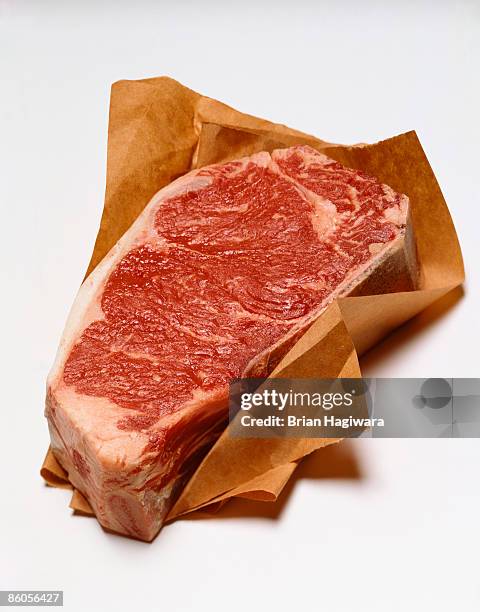 raw steak - brown paper isolated stock pictures, royalty-free photos & images