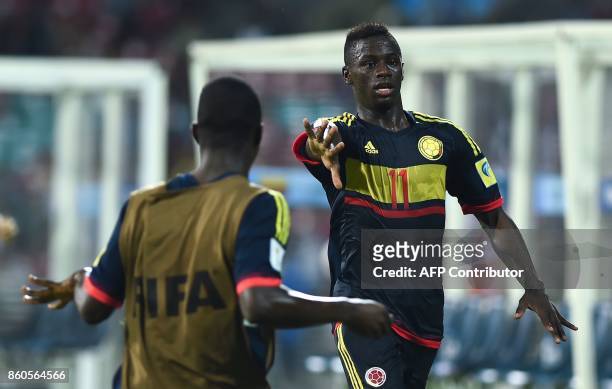 Juan Penaloza of Colombia celebrates after scoring a goal during the group stage football match between USA and Colombia in the FIFA U-17 World Cup...