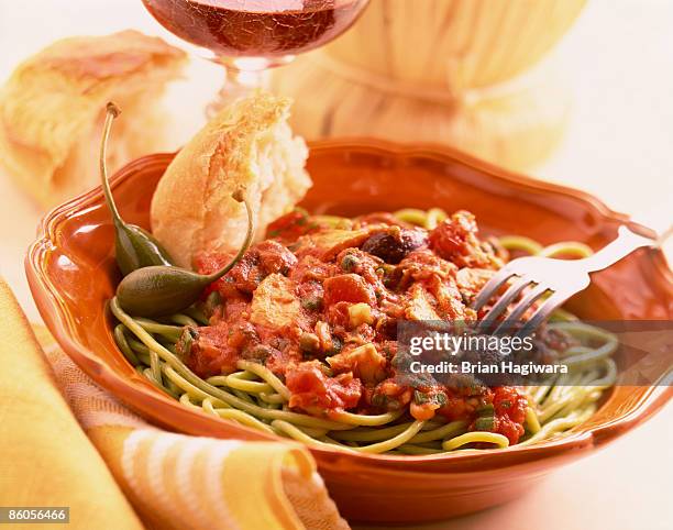 spaghetti puttanesca - puttanesca stock pictures, royalty-free photos & images