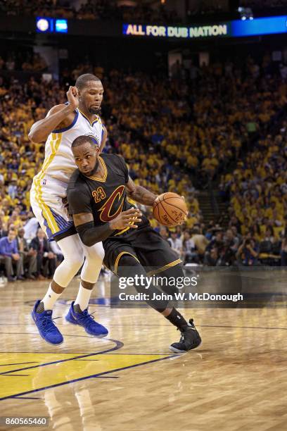 Finals: Cleveland Cavaliers LeBron James in action vs Golden State Warriors Kevin Durant at Oracle Arena. Game 2. Oakland, CA 6/4/2017 CREDIT: John...