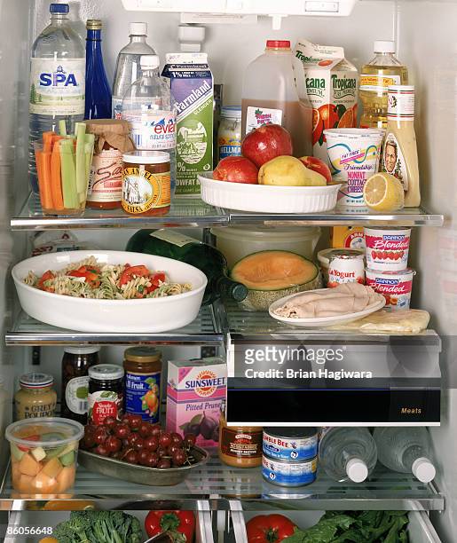 contents of a refrigerator - refrigerator stock-fotos und bilder