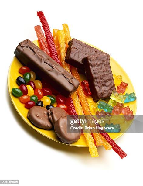 assorted candy on plate - candy dish stock pictures, royalty-free photos & images
