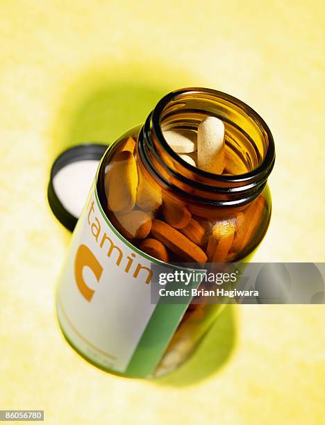 generic bottle of vitamin c - vitamina c foto e immagini stock