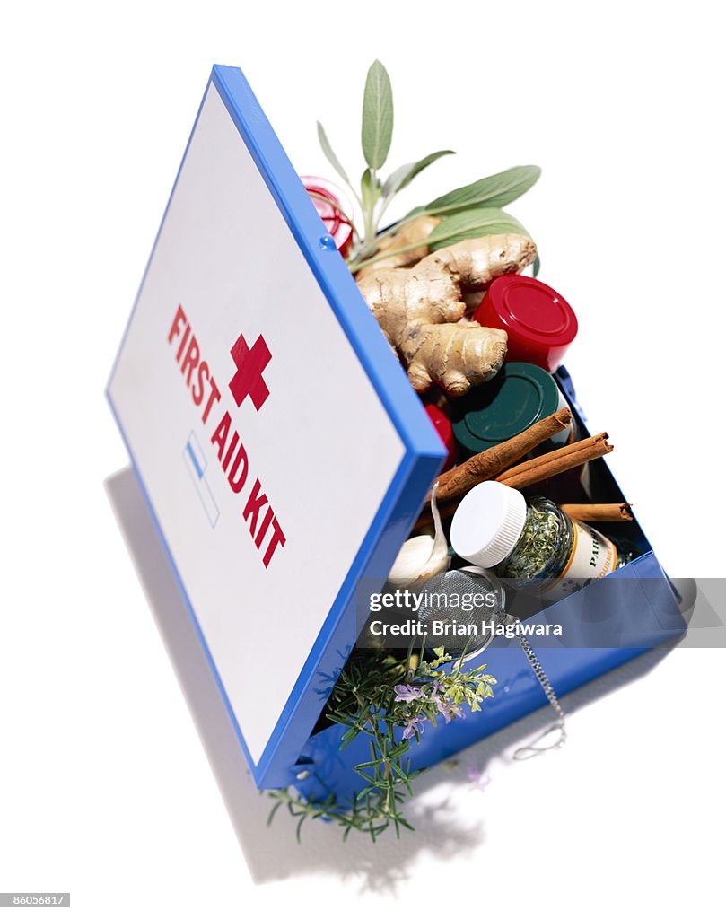 First aid kit with herbs and natural remedies