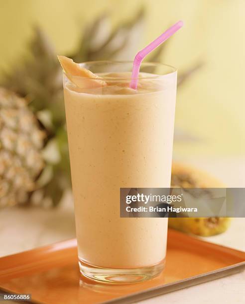 pineapple papaya smoothie - papaya stock pictures, royalty-free photos & images