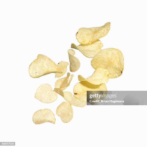 potato chips - falling food stock pictures, royalty-free photos & images