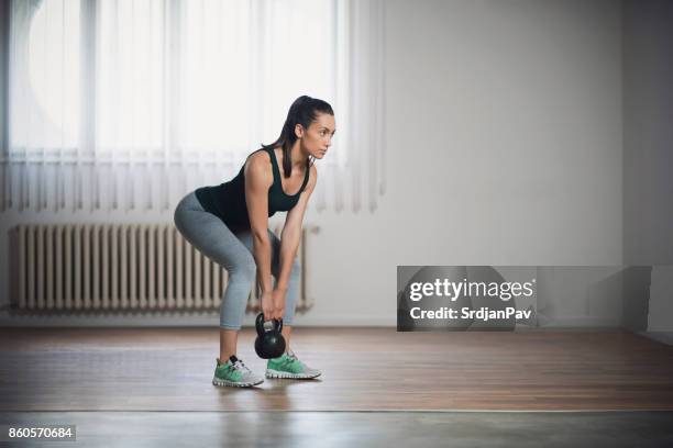 ready set sweat! - kettle bells stock pictures, royalty-free photos & images