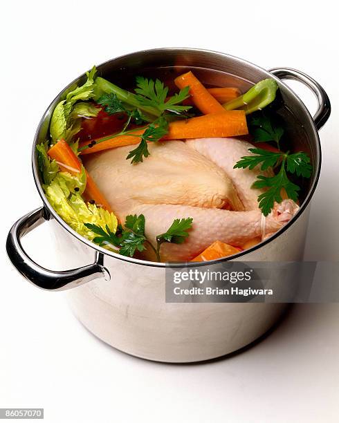 chicken soup - cooking chicken imagens e fotografias de stock