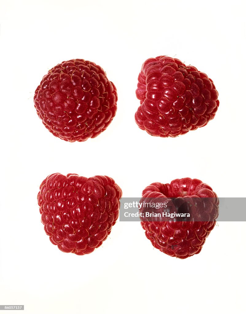 Close-up of raspberries on white