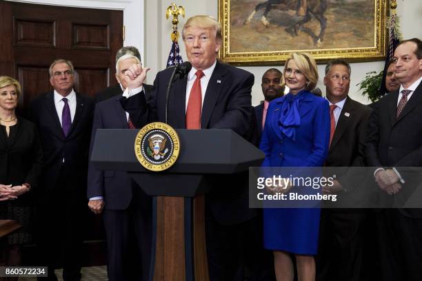 President Donald Trump speaks before signing an executive order on health care in the Roosevelt Room of the White House in Washington, D.C., U.S., on...