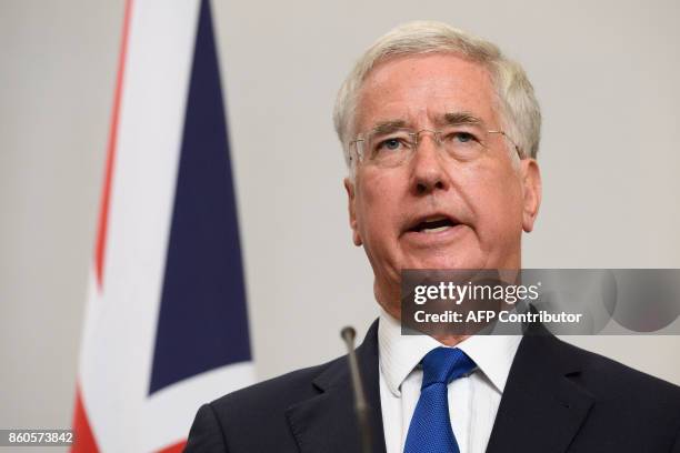 Britain's Defence Secretary Michael Fallon speaks during a joint UK/Poland press conference following bilateral talks at the Foreign and Commonwealth...