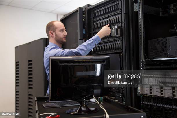 changing drive in server installation in large datacenter - backup stock pictures, royalty-free photos & images
