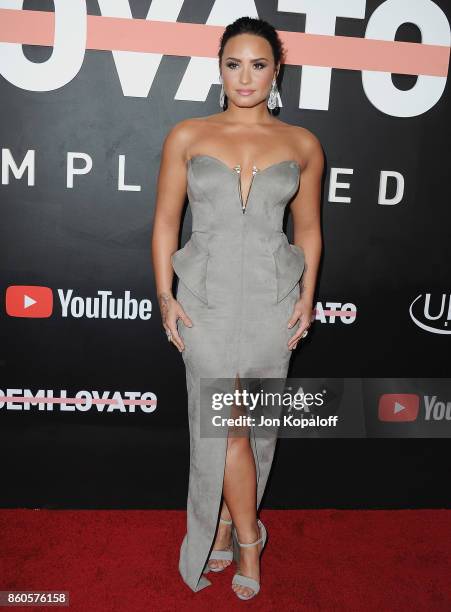 Demi Lovato arrives at the premiere of YouTube's "Demi Lovato: Simply Complicated" on October 11, 2017 at the Fonda Theatre in Los Angeles,...