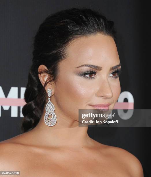 Demi Lovato arrives at the premiere of YouTube's "Demi Lovato: Simply Complicated" on October 11, 2017 at the Fonda Theatre in Los Angeles,...