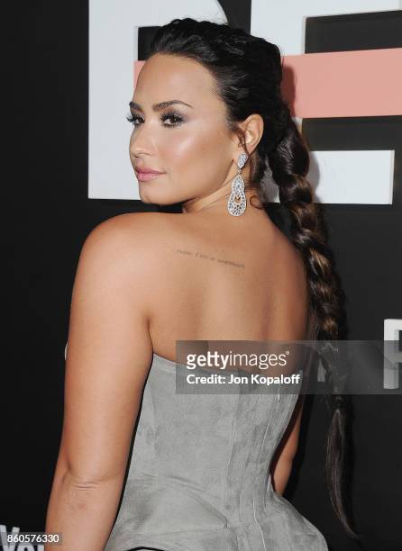 Demi Lovato arrives at the premiere of YouTube's "Demi Lovato: Simply Complicated" on October 11, 2017 at the Fonda Theatre in Los Angeles,...