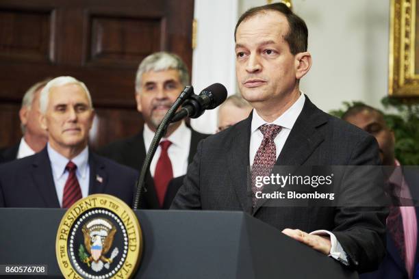 Alexander Acosta, U.S. Labor secretary, speaks before U.S. President Donald Trump, not pictured, signs an executive order on health care in the...
